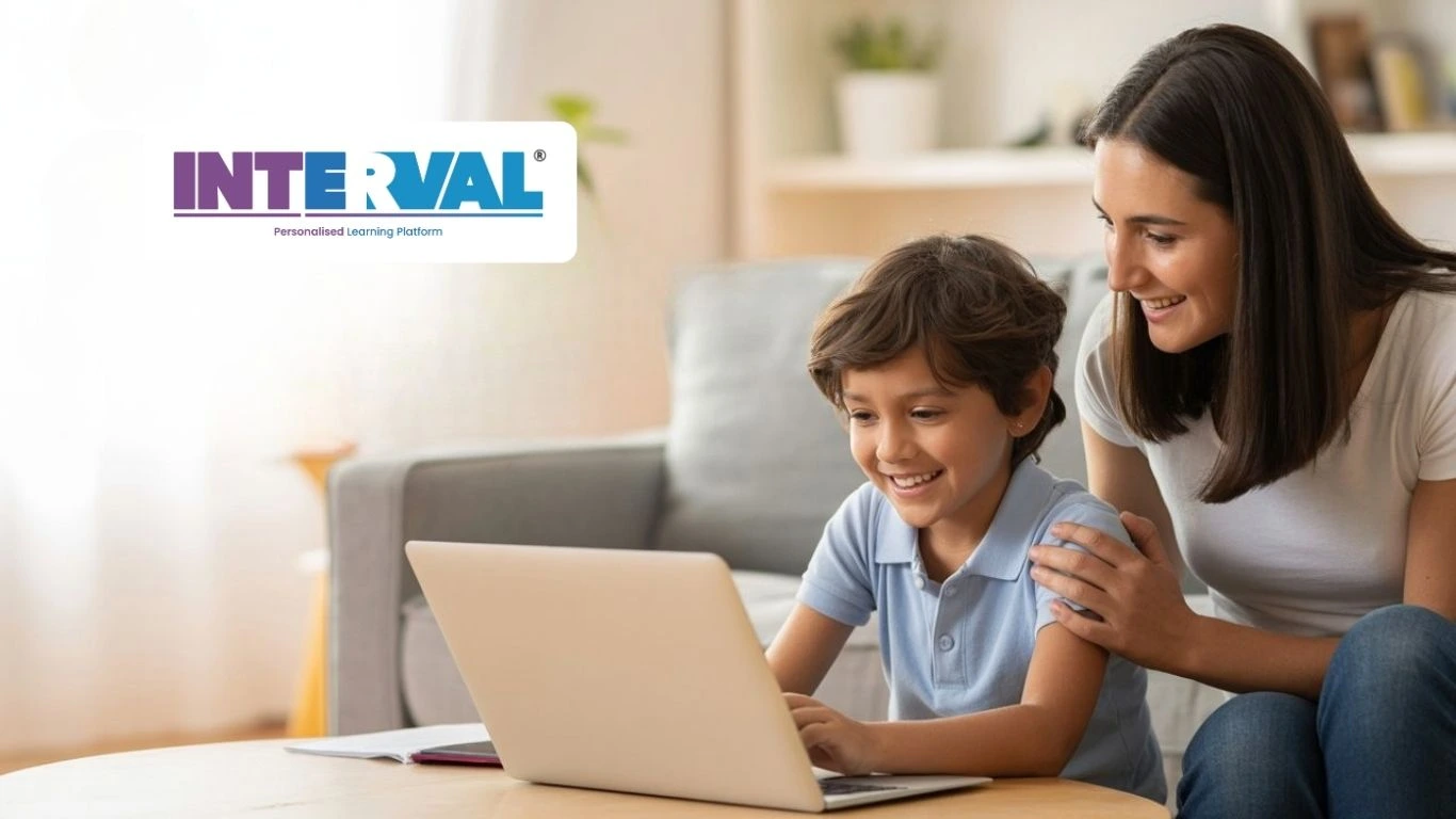 Mother guiding her child during an online tuition for Class 1 to 5 on a laptop at home